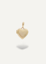 Gold heart-locket pendant on a white background