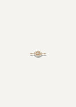 SB Studio golden eye charm bracelet featuring a delicate gold chain and a central eye motif with small diamonds.