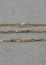solid 14k engravable bar charm from sb studio with other solid gold bracelets