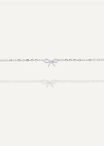 Silver chain bracelet with a bow charm on a white background from sb studio in edmonton