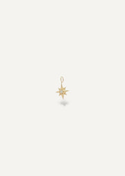 Solid 14k yellow Gold star-shaped pendant on a white background from SBStudio in Canada