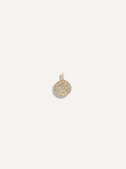 SB Studio circular pendant tag featuring a pavé diamond setting in yellow gold for permanent jewelry in Edmonton