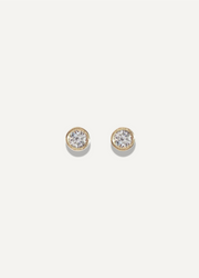 SB Studio Drop of Sparkle stud earrings featuring round brilliant-cut clear stones in a gold bezel setting.