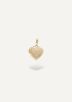 Heart-shaped solid 14k locket pendant on a white background from the sparkle bar
