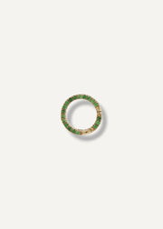 Gold charm holder with green gemstones on a white background from SB Studio in Edmonton