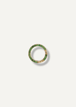 Gold charm holder with green gemstones on a white background from SB Studio in Edmonton