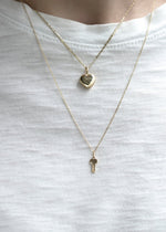 key and heart locket made of solid gold by sb studio