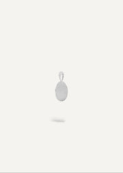 Side view of sterling silver engraveable oval charm pendant.
