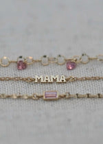 solid 14k bracelets from the sparkle bar with mama charm and sapphire gemstones