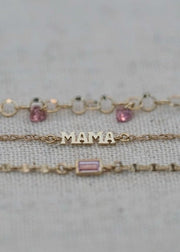 solid 14k bracelets from the sparkle bar with mama charm and sapphire gemstones