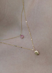 customizable necklaces in solid gold with gems and 14k gold hearts from sb studio in alberta