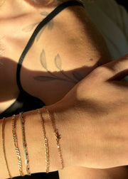 gold permanent jewelry in edmonton at sb studio