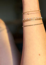 solid gold permanent bracelet at sb studio yeg