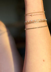 solid gold permanent bracelet at sb studio yeg
