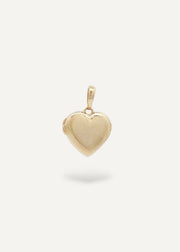 Gold heart-locket pendant on a white background
