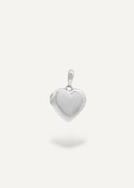Heart-shaped silver locket pendant on a white background from the sparkle bar