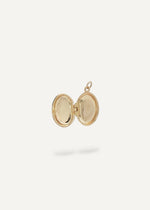 open engravable oval locket made of solid 14k gold from sb studio in alberta