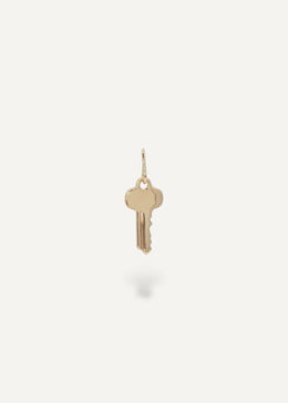Solid 14k Gold key pendant on a white background from sb studio in canada