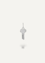 Silver engravable key pendant on a white background from sb studio