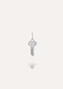 Silver engravable key pendant on a white background from sb studio