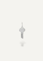 Silver engravable key pendant on a white background from sb studio