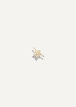 SB Studio Fleur charm bracelet featuring a delicate gold flower pendant with sparkling white topaz gemstone accents.