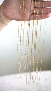 SB Studio Pixie Necklace featuring a delicate 1.1mm bi-colour diamond-cut raso chain in 10k yellow and white gold.