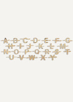 The Sparkle Bar 14k yellow gold alphabet letter charms for a custom bracelet, featuring A-Z letters.