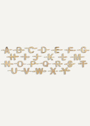 The Sparkle Bar 14k yellow gold alphabet letter charms for a custom bracelet, featuring A-Z letters.