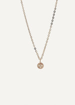 Sb Studio 14k yellow gold button charm pendant on a delicate cable chain for a minimalist necklace look.