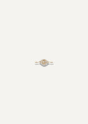SB Studio golden eye charm bracelet featuring a delicate gold chain and a central eye motif with small diamonds.