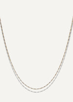 SB studio Pixie necklace featuring a delicate 1.1mm bi-colour diamond-cut raso chain in 10k yellow and white gold