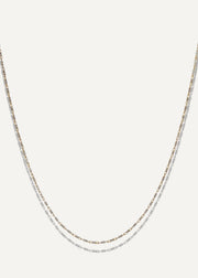 SB studio Pixie necklace featuring a delicate 1.1mm bi-colour diamond-cut raso chain in 10k yellow and white gold