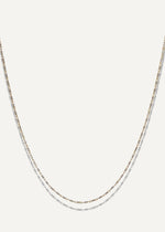 SB studio Pixie necklace featuring a delicate 1.1mm bi-colour diamond-cut raso chain in 10k yellow and white gold