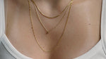 sb studio Pixie Necklace featuring a delicate 10k yellow and white gold bi-colour diamond-cut raso chain.