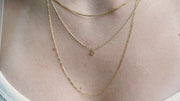 Sb Studio Pixie Necklace featuring a delicate 10k yellow and white gold bi-colour diamond-cut raso chain.