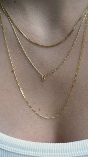 Sb Studio Pixie Necklace featuring a delicate 10k yellow and white gold bi-colour diamond-cut raso chain.