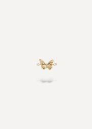 solid 14k Gold butterfly-shaped charm on a white background from sb studio
