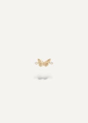 solid 14k Gold butterfly-shaped charm on a white background from sb studio