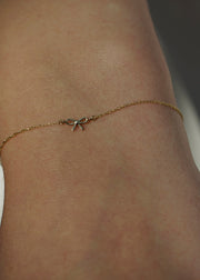 14k yellow solid gold bow charm from SB Studio
