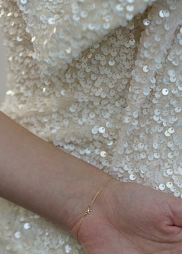 solid 14k gold sweest bow charm bracelet from SB Studio