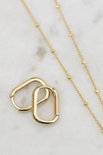 solid gold paper clip earrings and satellite chain necklace from the sparkle bar in edmonton
