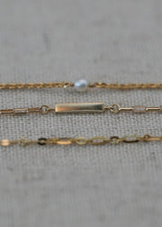 solid 14k engravable bar charm from sb studio with other solid gold bracelets