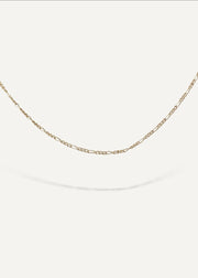 Solid 14k gold chain necklace on a white background from sb studio