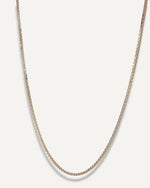 The Sparkle Bar Bridget necklace featuring a bi-coloured box chain in solid 10k yellow and white gold.