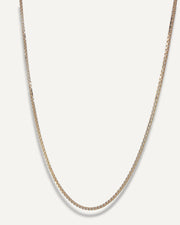 The Sparkle Bar Bridget necklace featuring a bi-coloured box chain in solid 10k yellow and white gold.