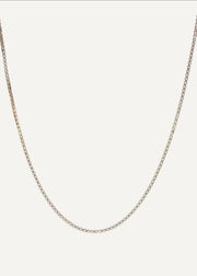 The Sparkle Bar Bridget necklace featuring a bi-coloured box chain in solid 10k yellow and white gold.