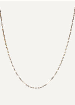The Sparkle Bar Bridget necklace featuring a bi-coloured box chain in solid 10k yellow and white gold.
