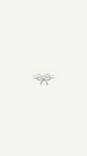 The Sparkle Bar dainty gold bow charm for a bracelet, featuring a minimalist design for everyday wear.