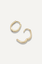 The Sparkle Bar Karin pear-shaped hoop earrings in polished 14k gold with a hinged closure on a white background.